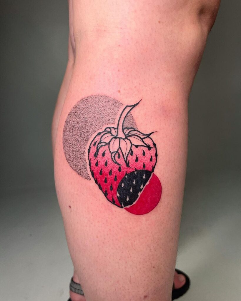 A combination of different methods strawberry tattoo on leg 