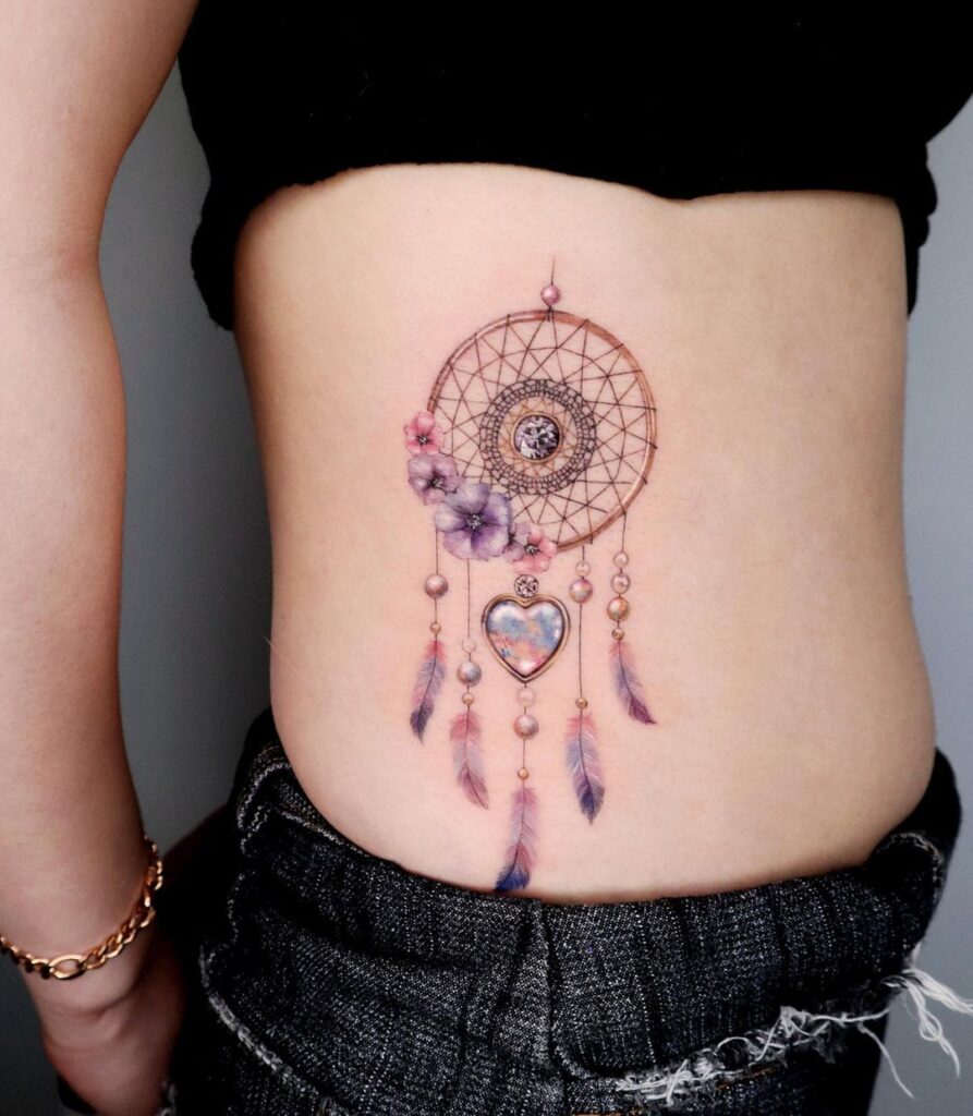 A dream catcher on the side of the stomach