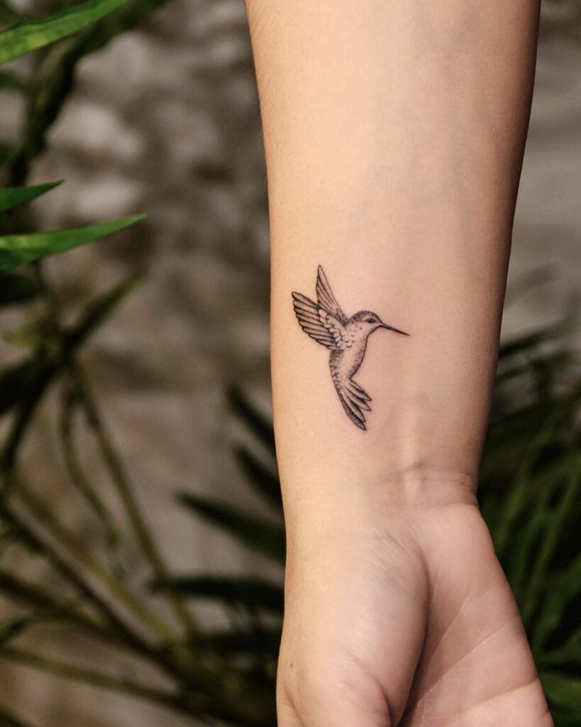 A hummingbird wrist tattoo 