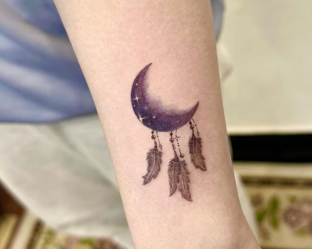 A moon dream catcher tattoo