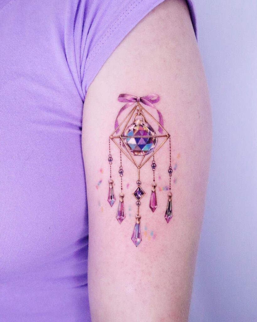 A purple dream catcher tattoo 