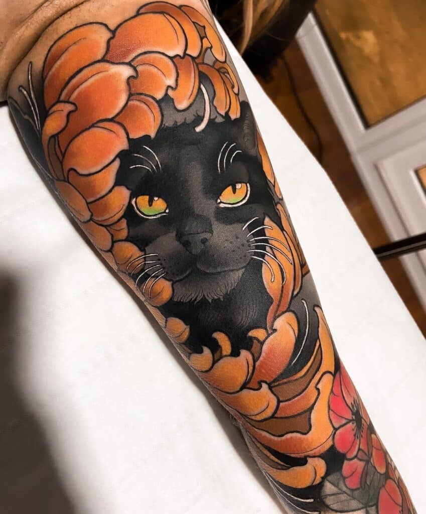 Neo-traditional tattoo on arm showcasing a black cat with captivating yellow eyes, enveloped in a bed of rich orange flowers, demonstrating the distinctive bold line work and lush coloring of the neo-traditional style.