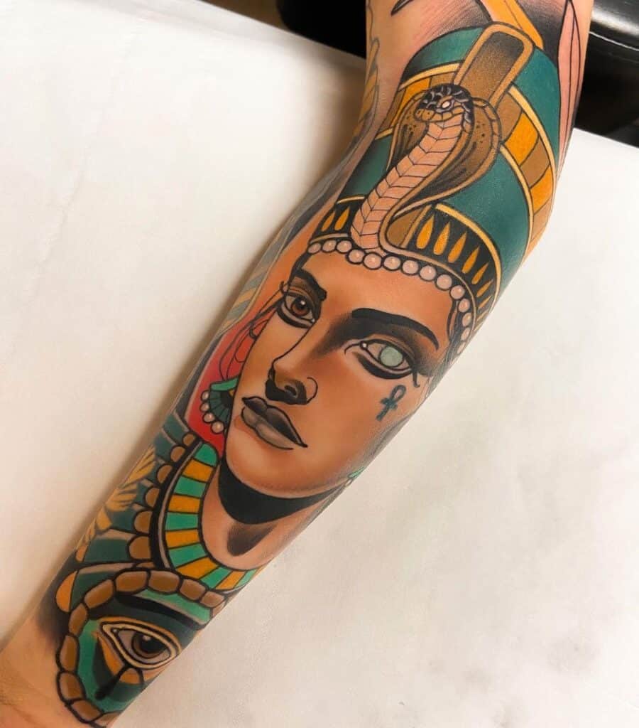 Neo-traditional tattoo of Nefertiti, an iconic figure from Egyptian culture. This tattoo style infuses traditional elements with modern flair, enhancing the allure of the design and ensuring a captivating and visually striking tattoo.