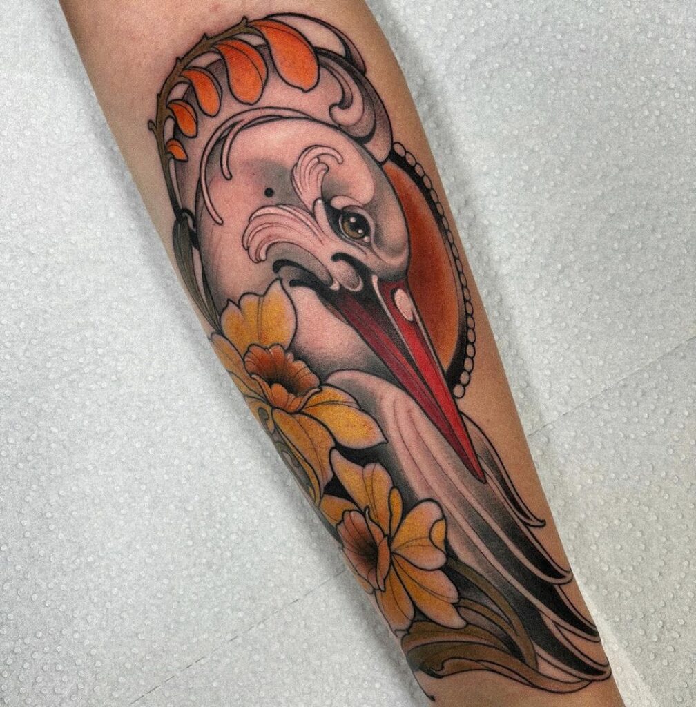 Neo-traditional tattoo of a stork, a symbol of spiritual transformation and storytelling, depicted in a vibrant and stylized neo-traditional style. This tattoo style adds depth and character to the symbolic meaning of the stork, making it a captivating and meaningful body art choice.