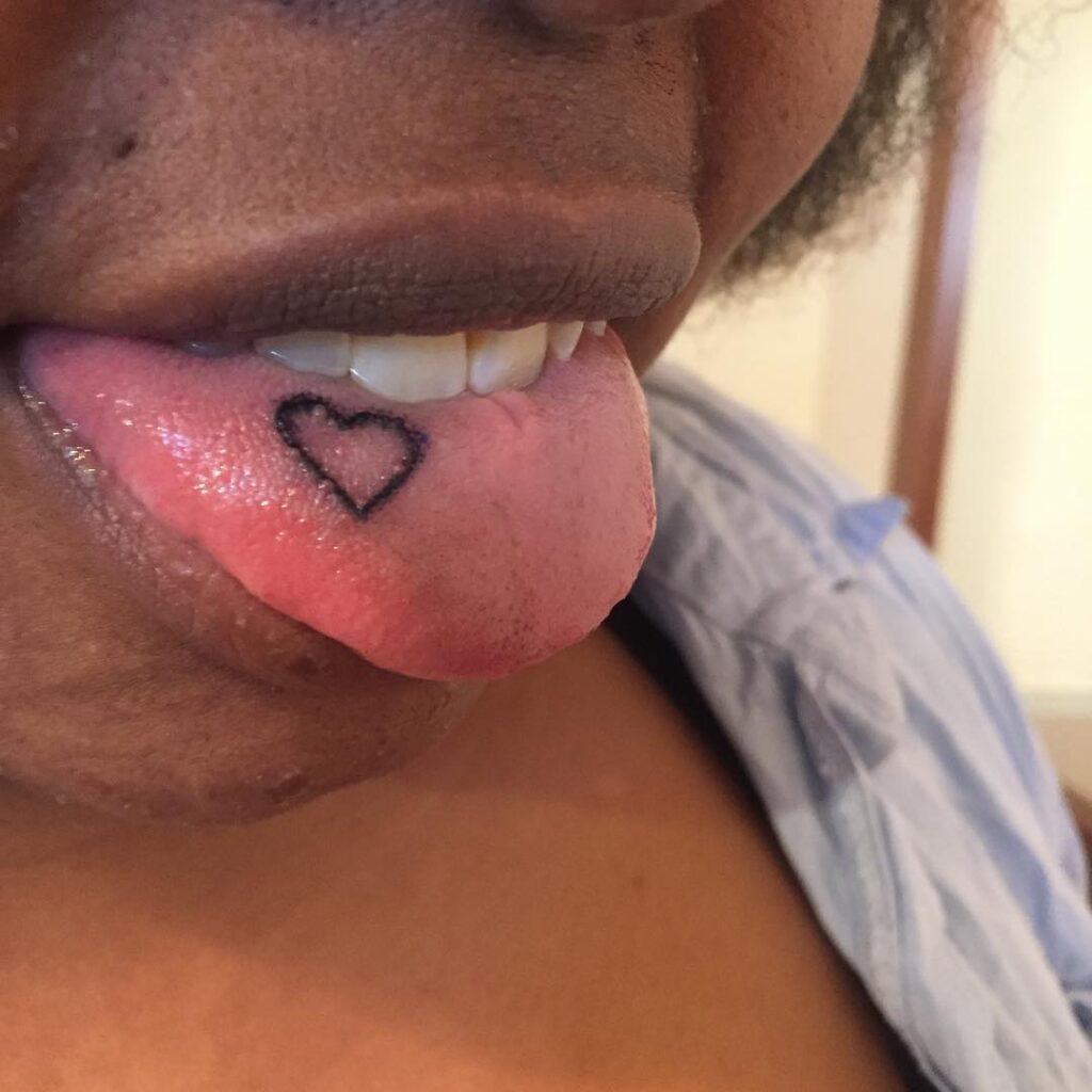 21 Popular Tongue Tattoos That'll Tickle Your Taste Buds