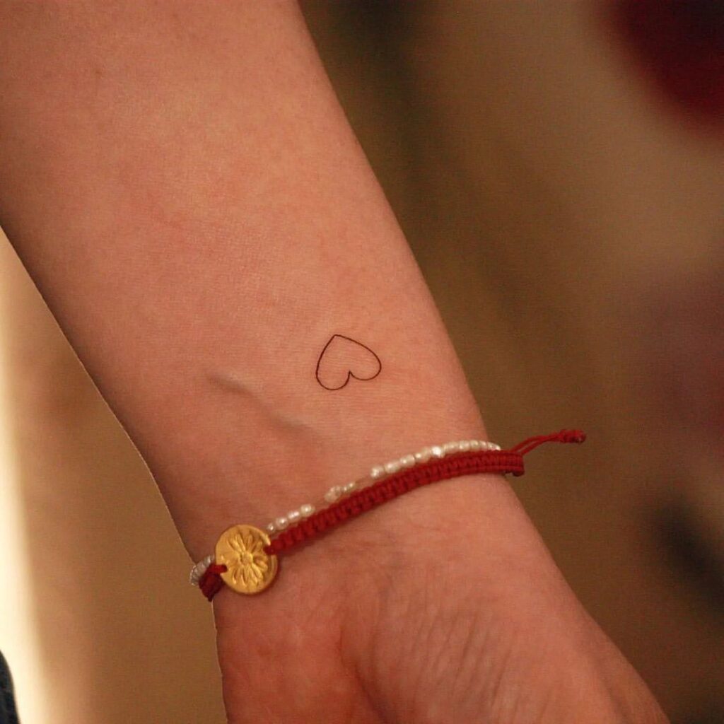 23 Small Heart Hand Tattoos To Bring Out Your Inner Romantic